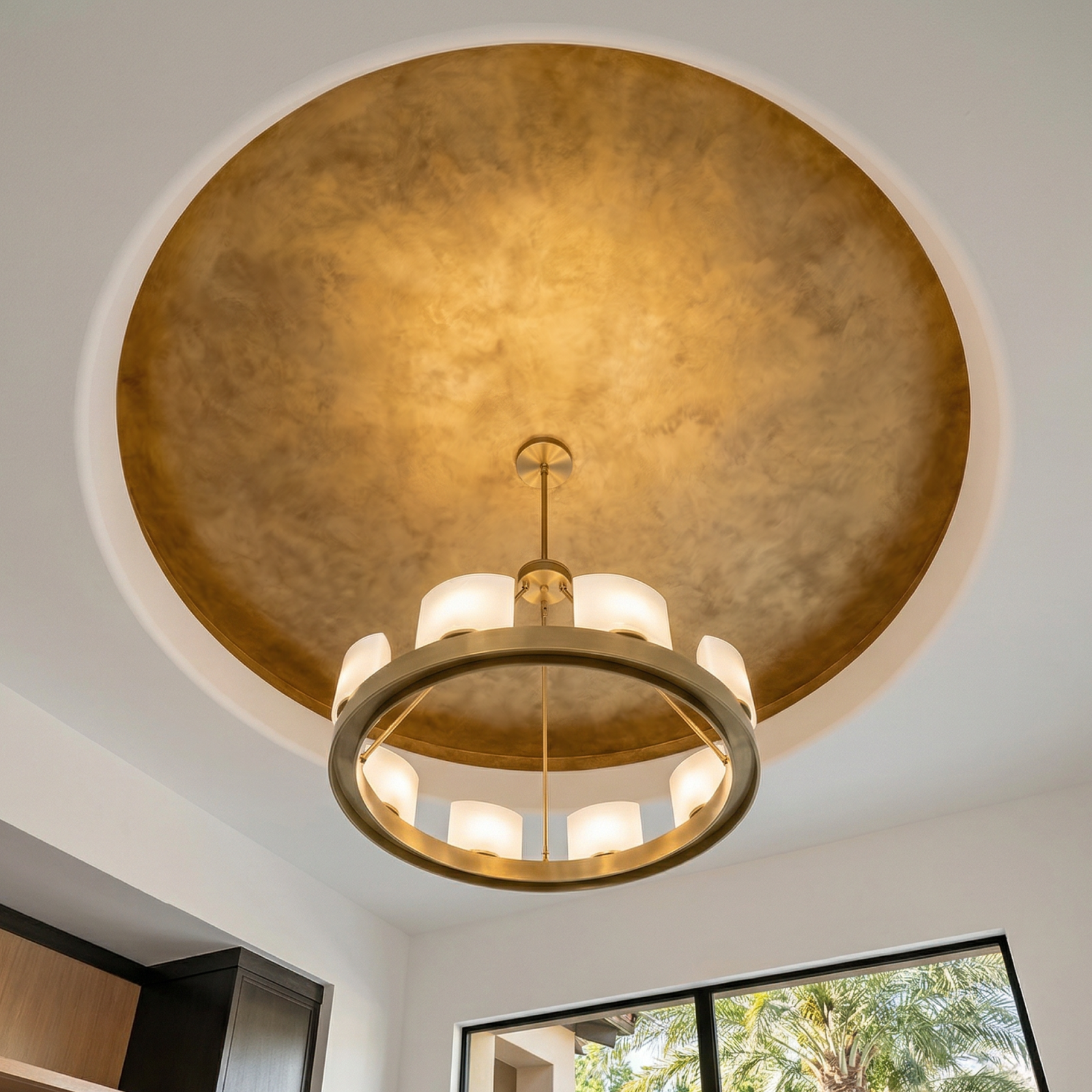 Gilded Venetian Plaster ceiling medallion with brass chandelier
